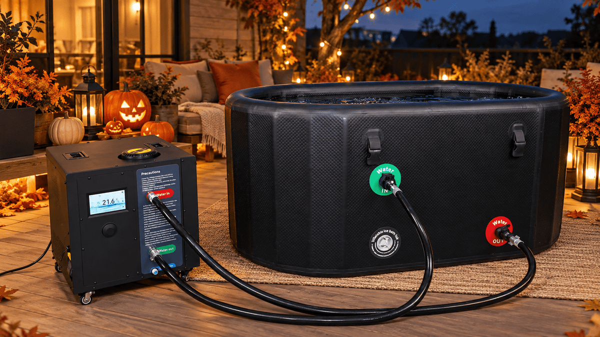 Halloween cold plunge setup with a black inflatable tub, separate water chiller, pumpkins and autumn backyard decorations.
